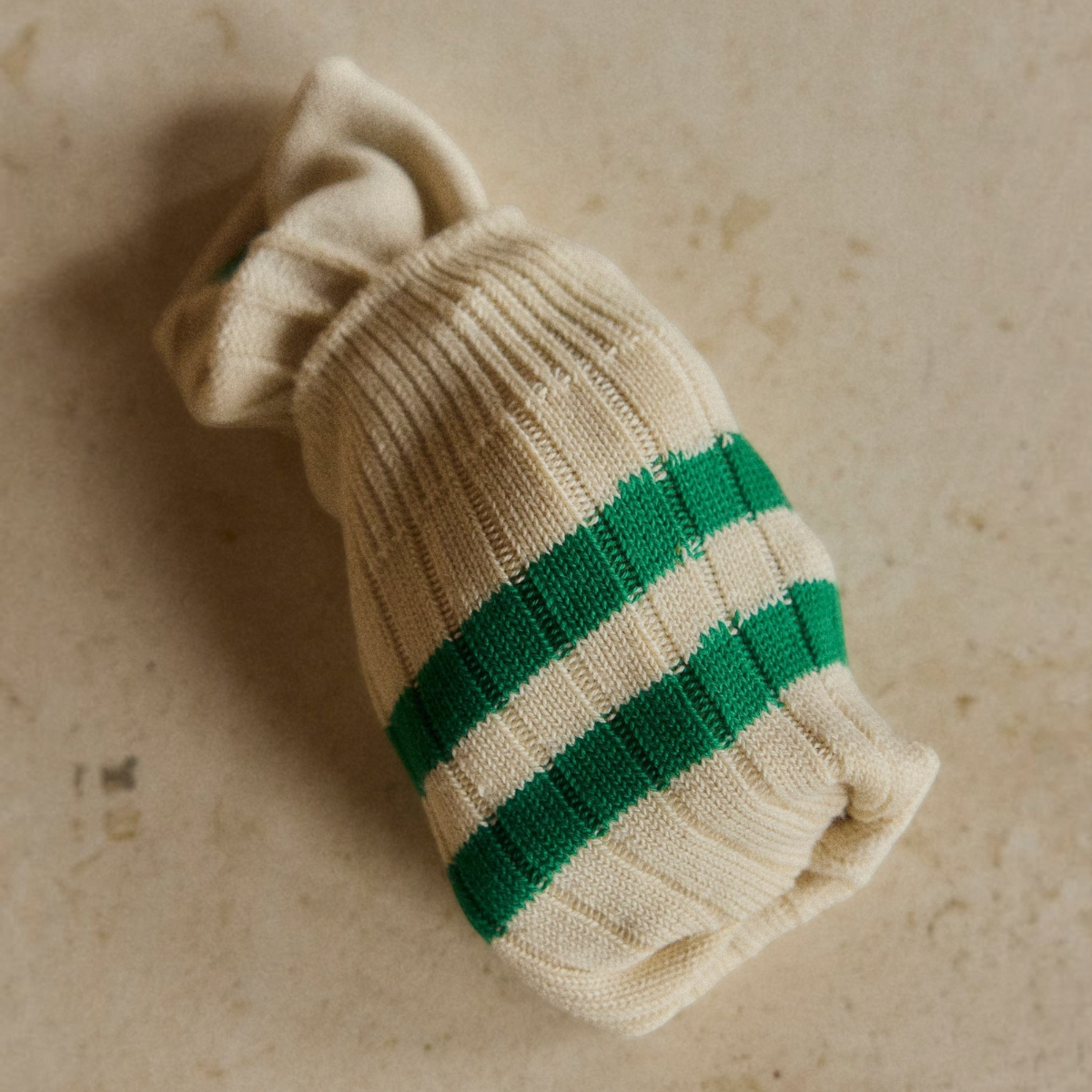 MILWORKS vintage-inspired cream cotton socks with green ribbed stripes, folded for a compact athletic look.
