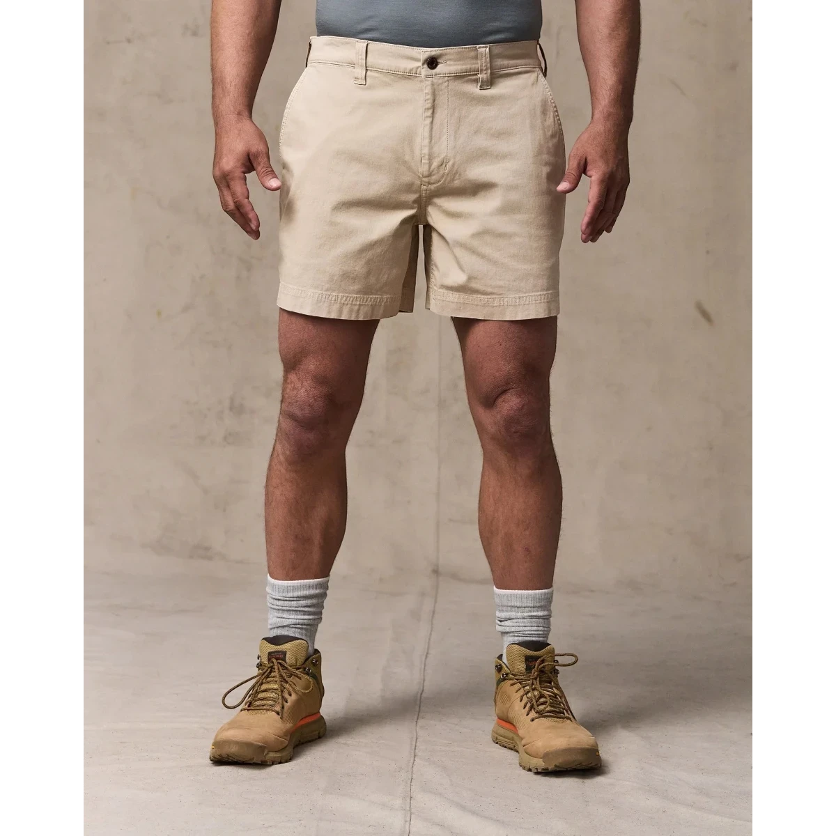 MILWORK Granite Mountain 6" shorts in buck tan cotton-blend with zippered fly, metal button, and multiple pockets.