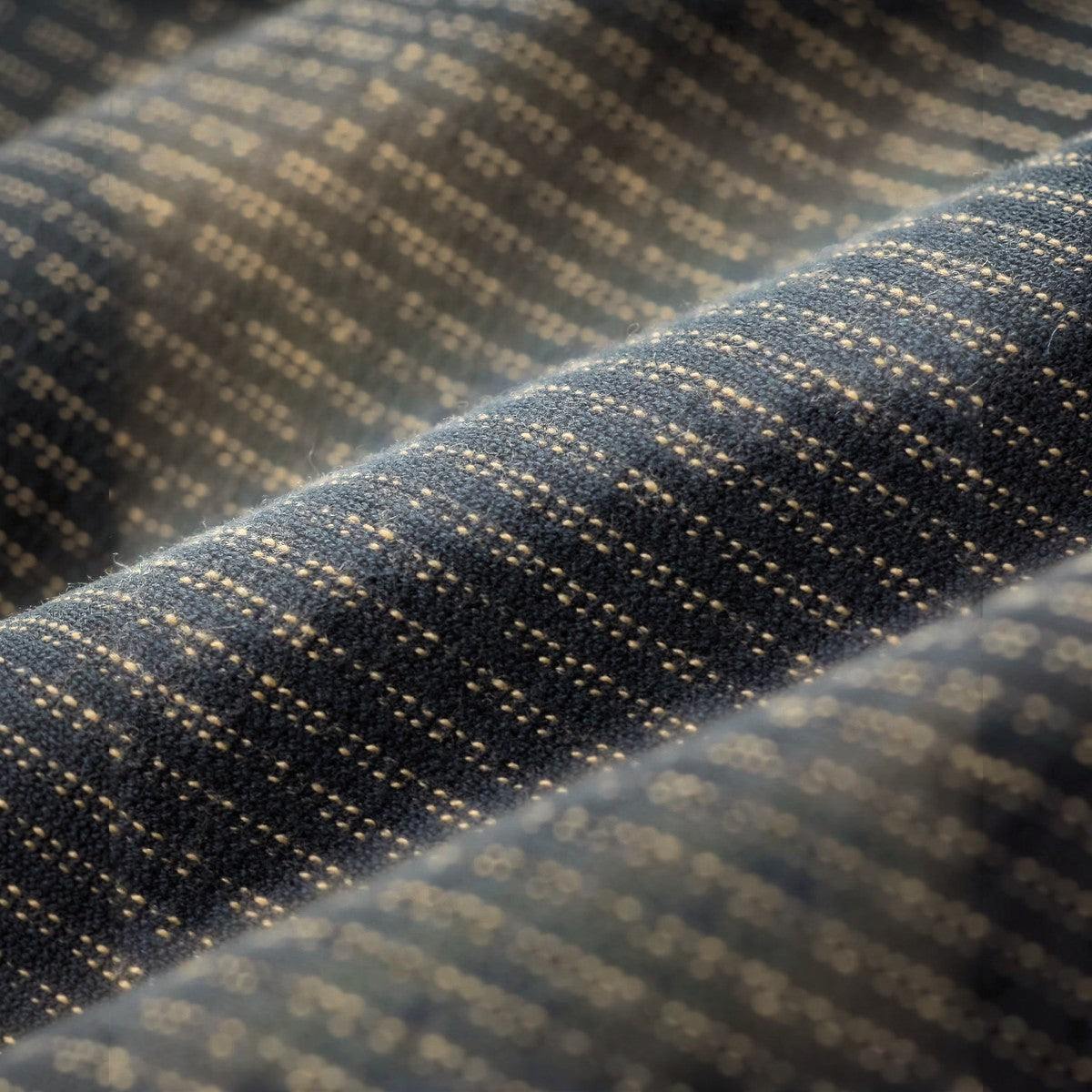 Close-up of RRL charcoal multi cotton-blend fleece fabric with a textured striped pattern