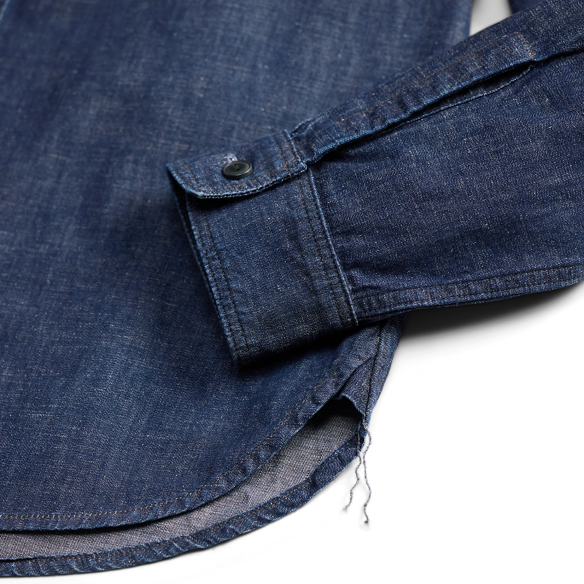 RRL indigo denim workshirt featuring a buttoned barrel cuff and authentic runoff chain-stitched side seams.