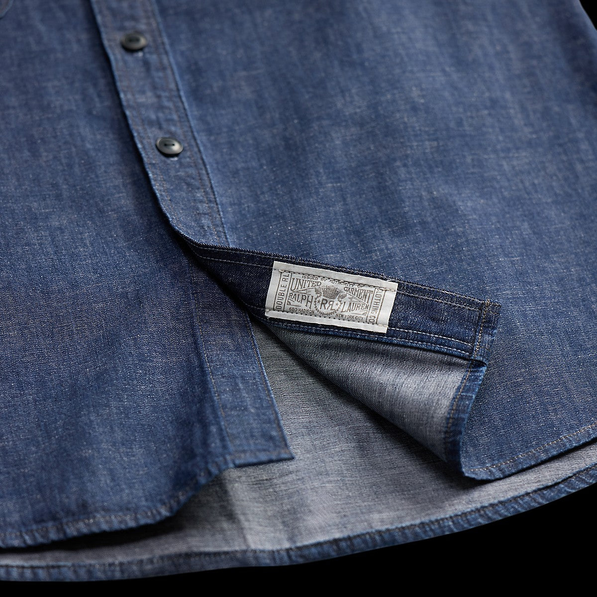 RRL indigo denim workshirt featuring vintage-inspired buttons and a classic woven brand label on the placket
