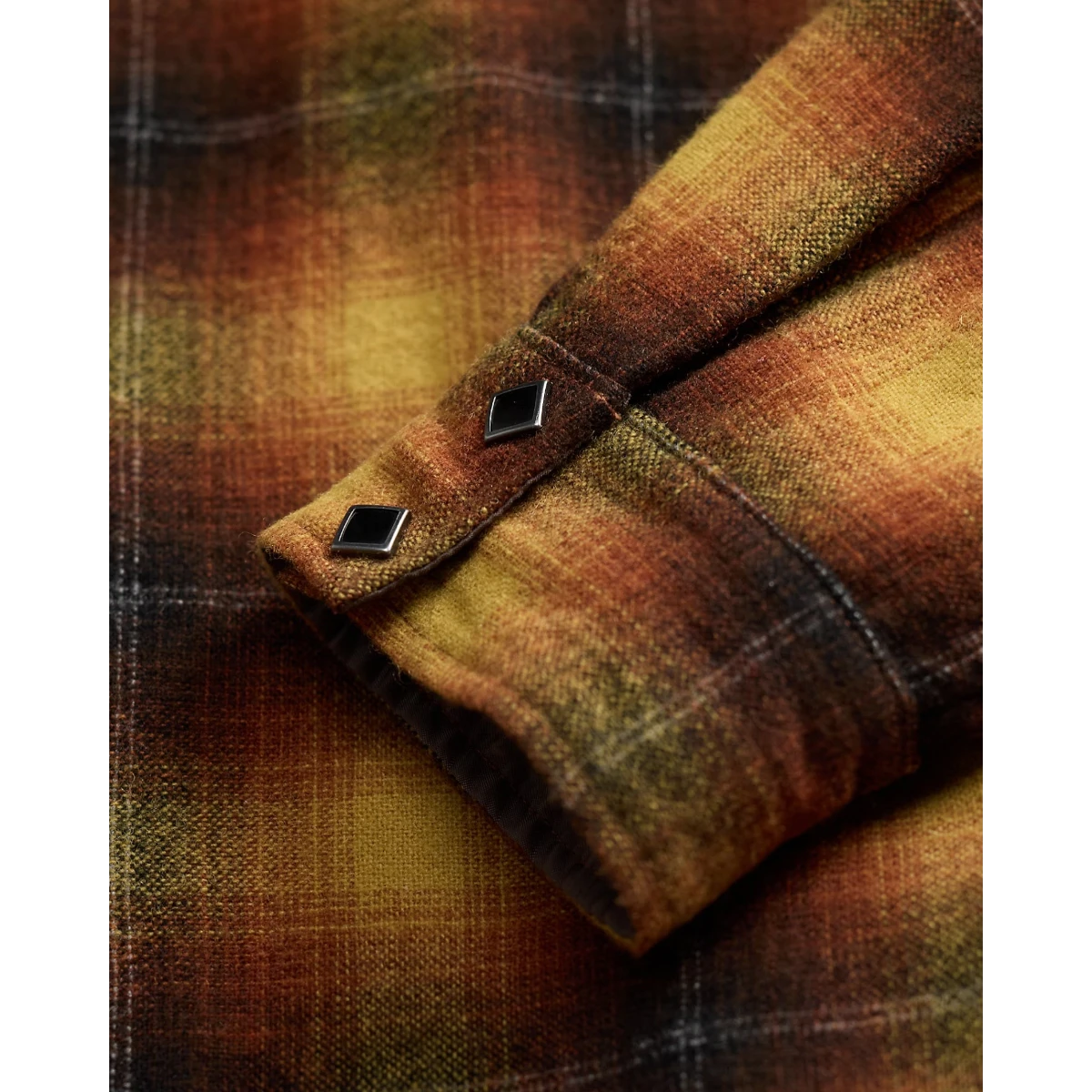 RRL plaid wool-blend camp shirt in orange and yellow with diamond-shaped snap closures on the sleeve cuff.