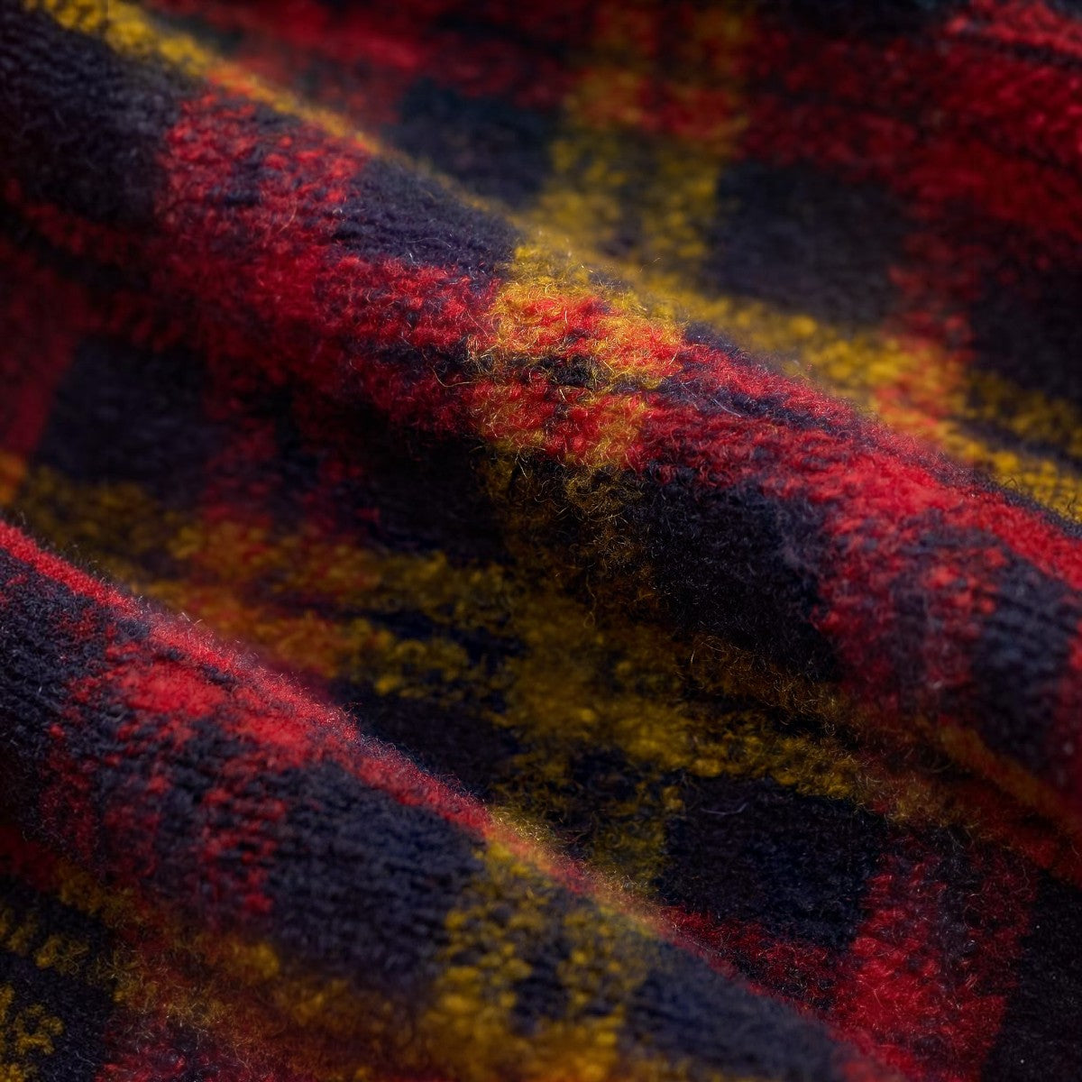 RRL red multi plaid wool-blend jacquard fabric texture close-up of a vintage-inspired flight jacket