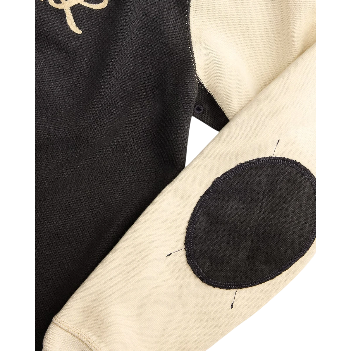 RRL two-tone cotton jersey t-shirt in faded black and cream with a reinforced dark elbow patch on the sleeve.