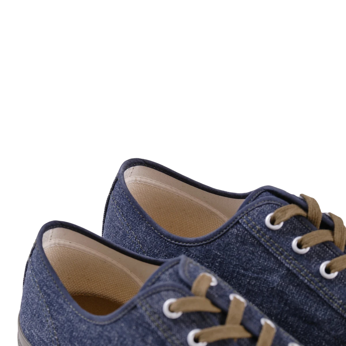 MILWORKS Amoskeag indigo denim Champion sneakers with brown cotton laces and vulcanized rubber soles.