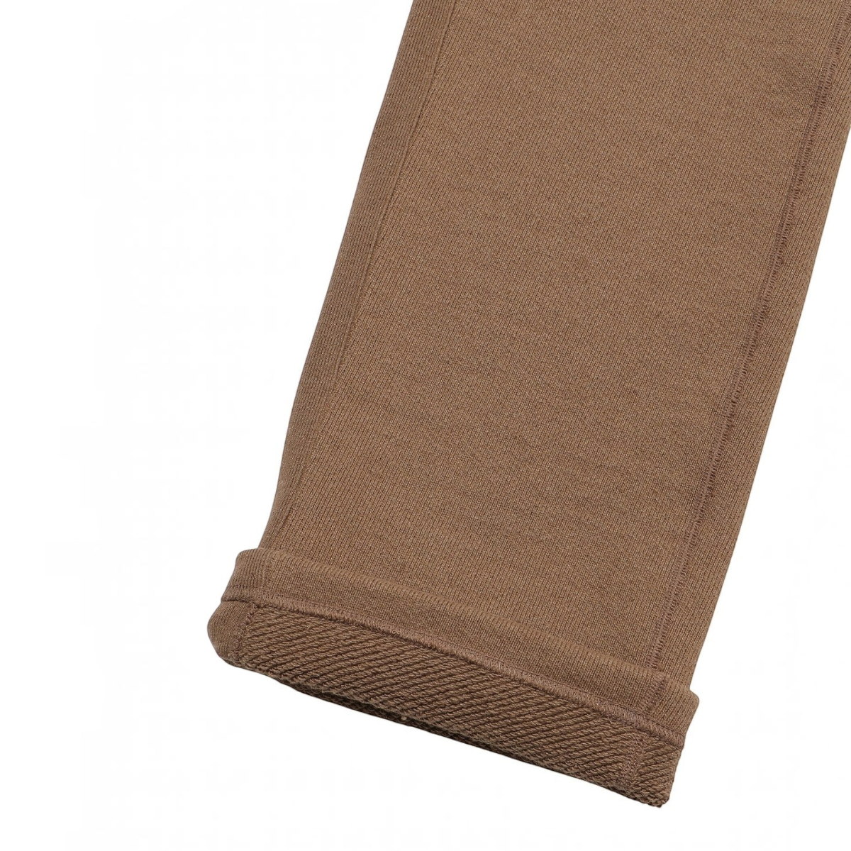 milworks.momyote brown heavy French terry sweatpants cuff showing the thick, textured loopback interior fabric.