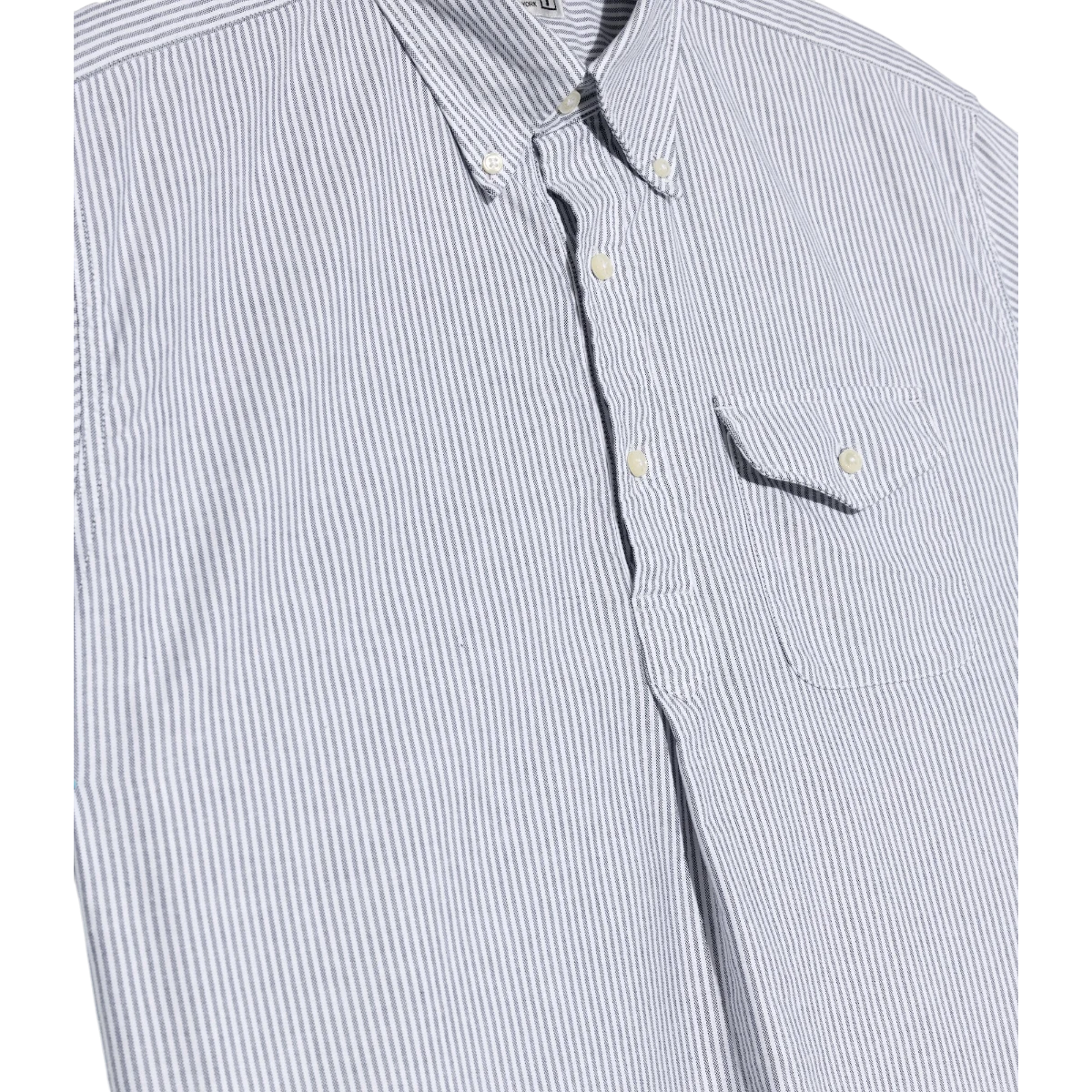 MILWORK Popover shirt in blue and white cotton candy stripe Oxford fabric with button-down collar and chest pocket.