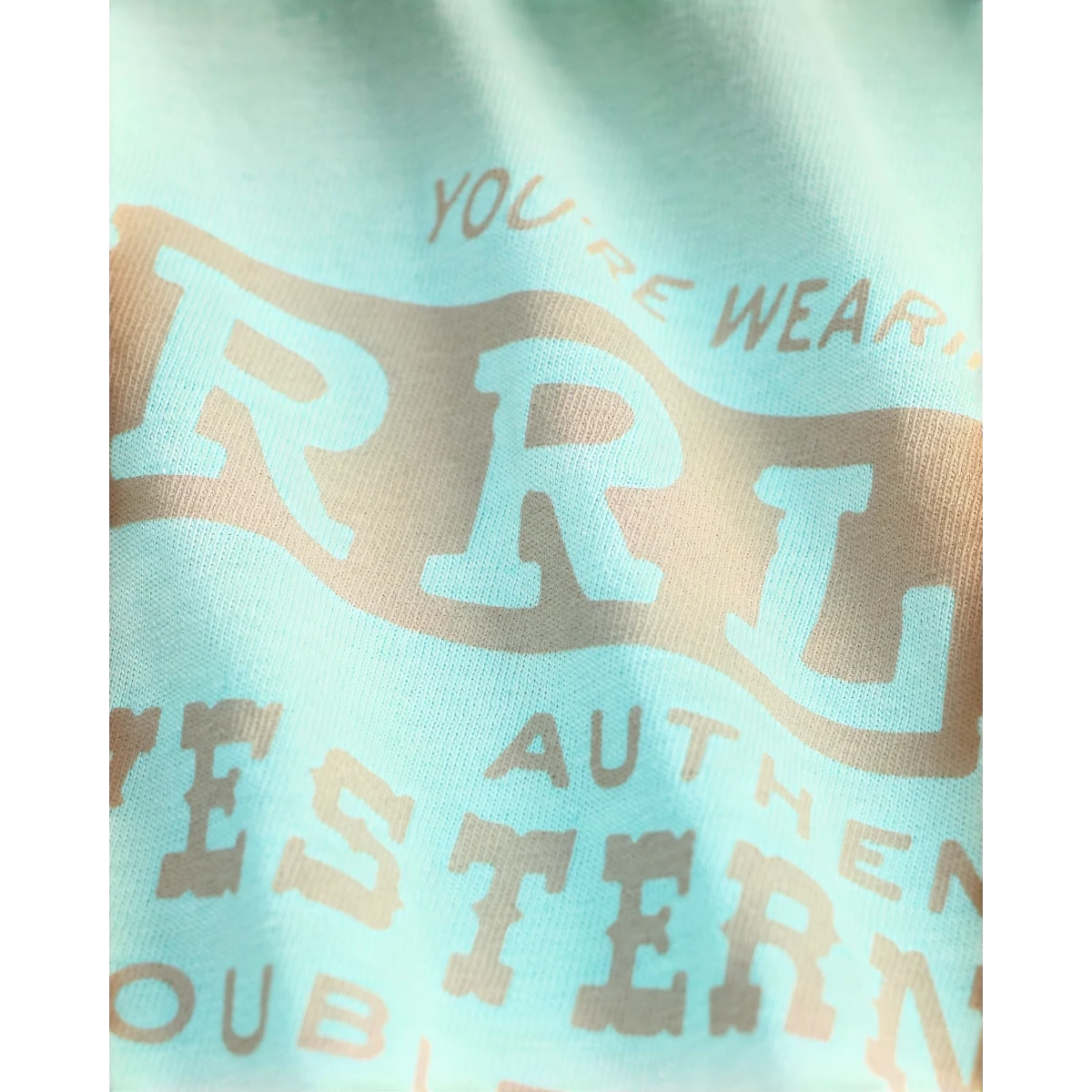 MILWORK Faded turquoise cotton-hemp t-shirt with a vintage effect graphic print on the front.