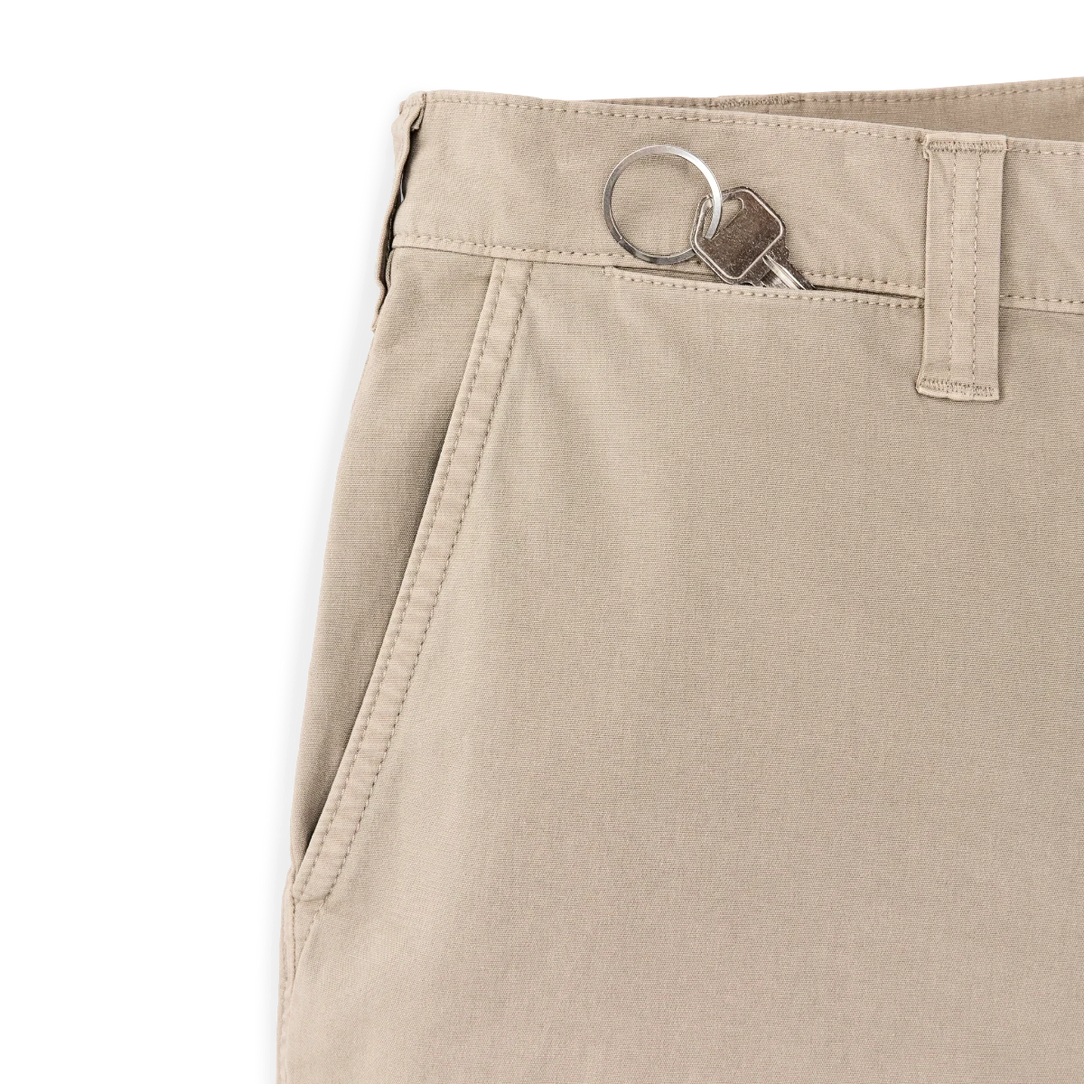 MILWORK Granite Mountain 6" shorts in buck tan cotton-blend fabric with front slash pockets and a key on a ring in the waistband.
