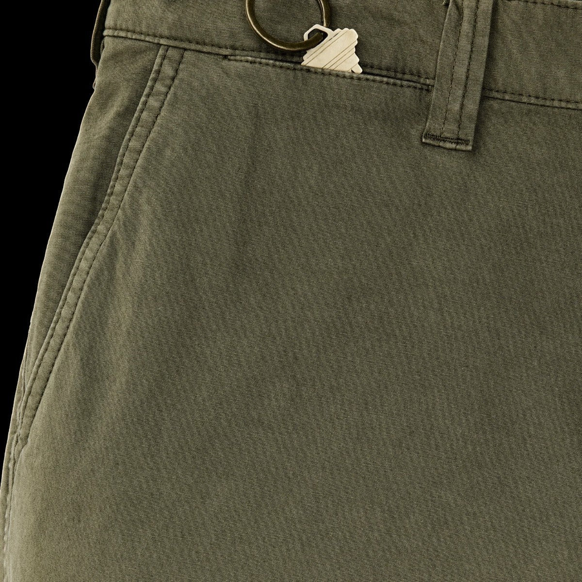 MILWORK Granite Mountain 6" shorts in burnt olive cotton-blend fabric with a key in the pocket.