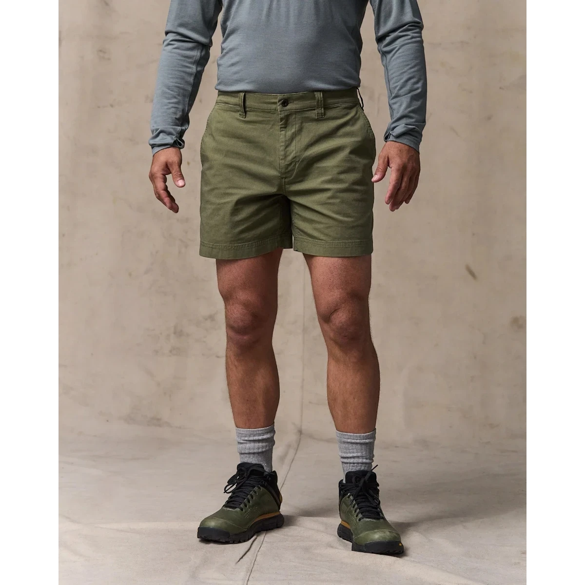 MILWORK Granite Mountain 6" shorts in burnt olive, made from cotton-blend fabric with a zippered fly and metal button closure.