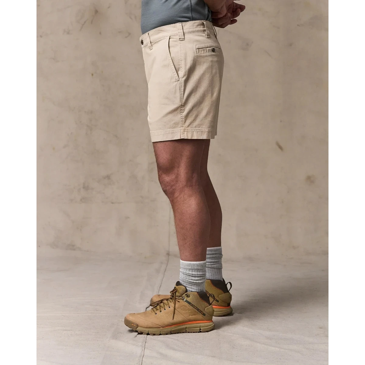 MILWORK Granite Mountain 6" shorts in buck tan cotton-blend fabric with zippered fly, metal shank button, and multiple pockets.