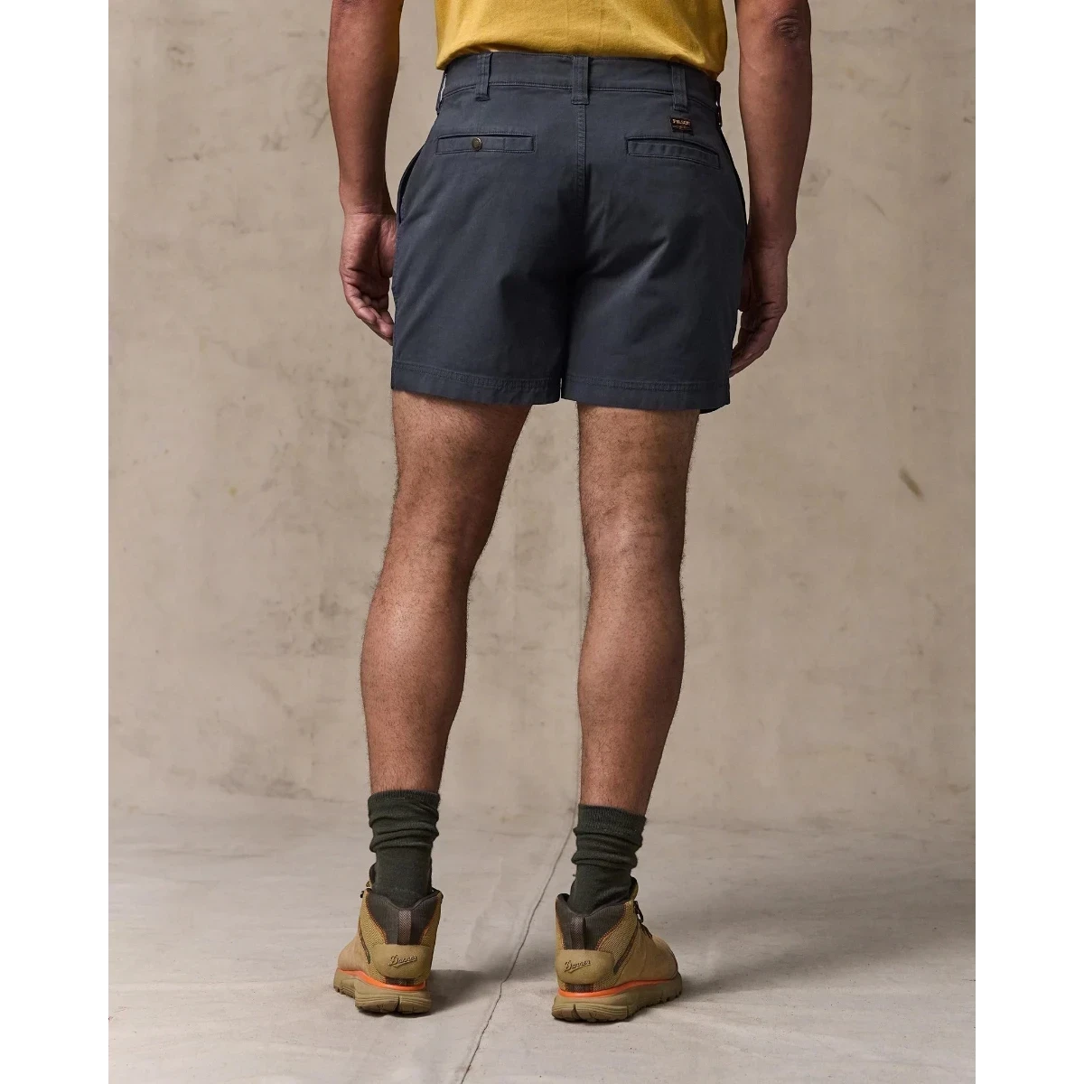 MILWORK Granite Mountain 6" shorts in ink blue. Cotton-blend fabric with a comfortable stretch, zippered fly, and multiple pockets.