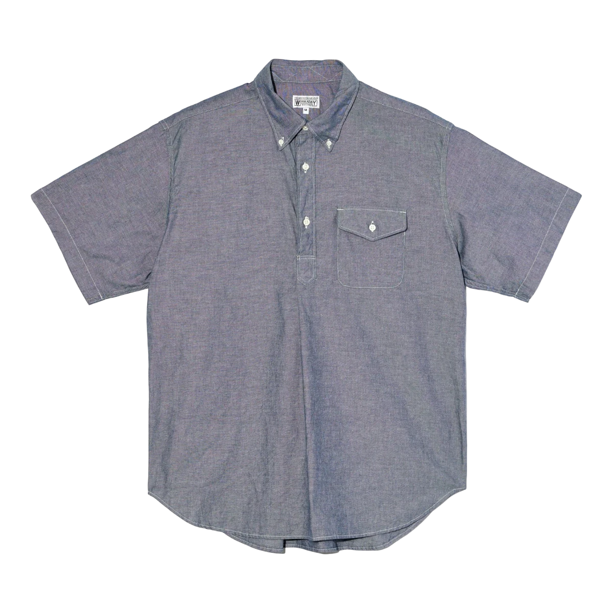 MILWORK Indigo Cotton Chambray short-sleeve popover shirt with button-down collar and chest pocket.