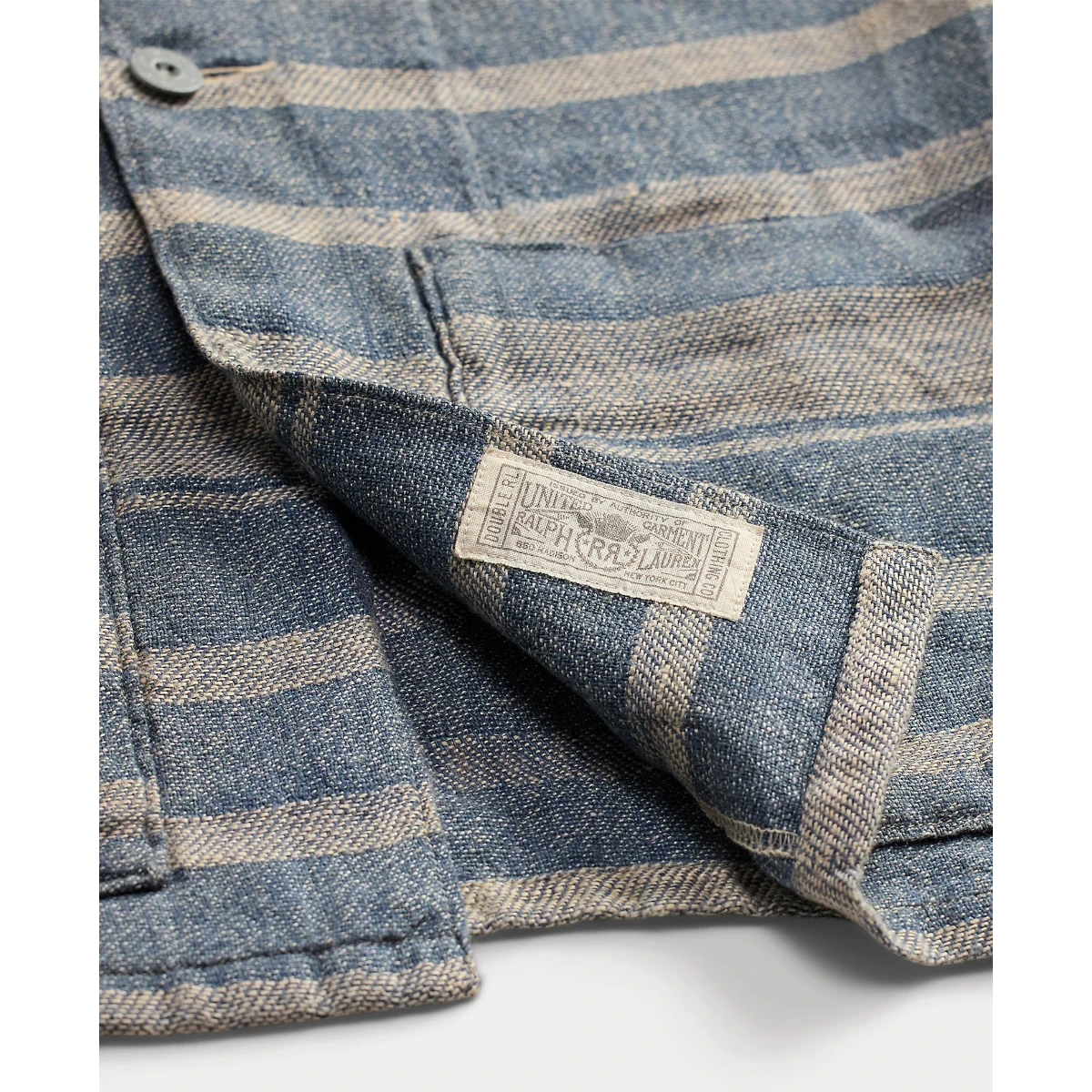 MILWORK Indigo Cream striped linen dobby overshirt with metal buttons and a rustic texture.