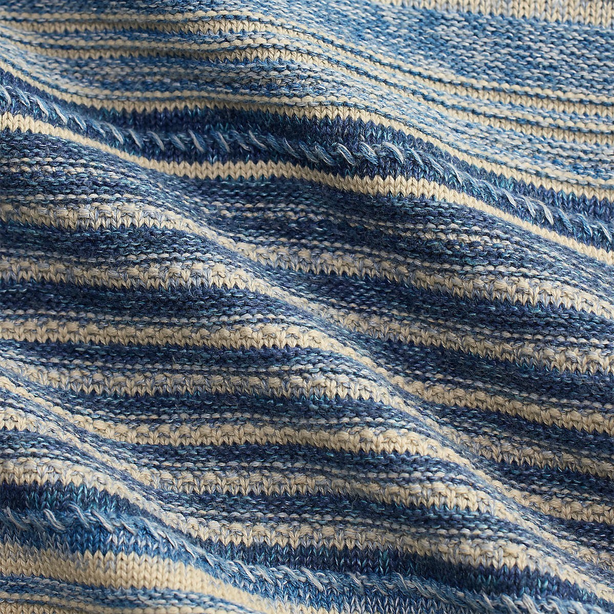 MILWORK Indigo Multi striped long sleeve sweater cardigan made of knit fabric.