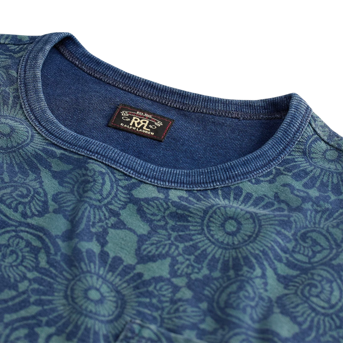 MILWORK Indigo Print Jersey T-Shirt with vintage-inspired pattern, crewneck, and chest pocket. Made from 100% cotton.