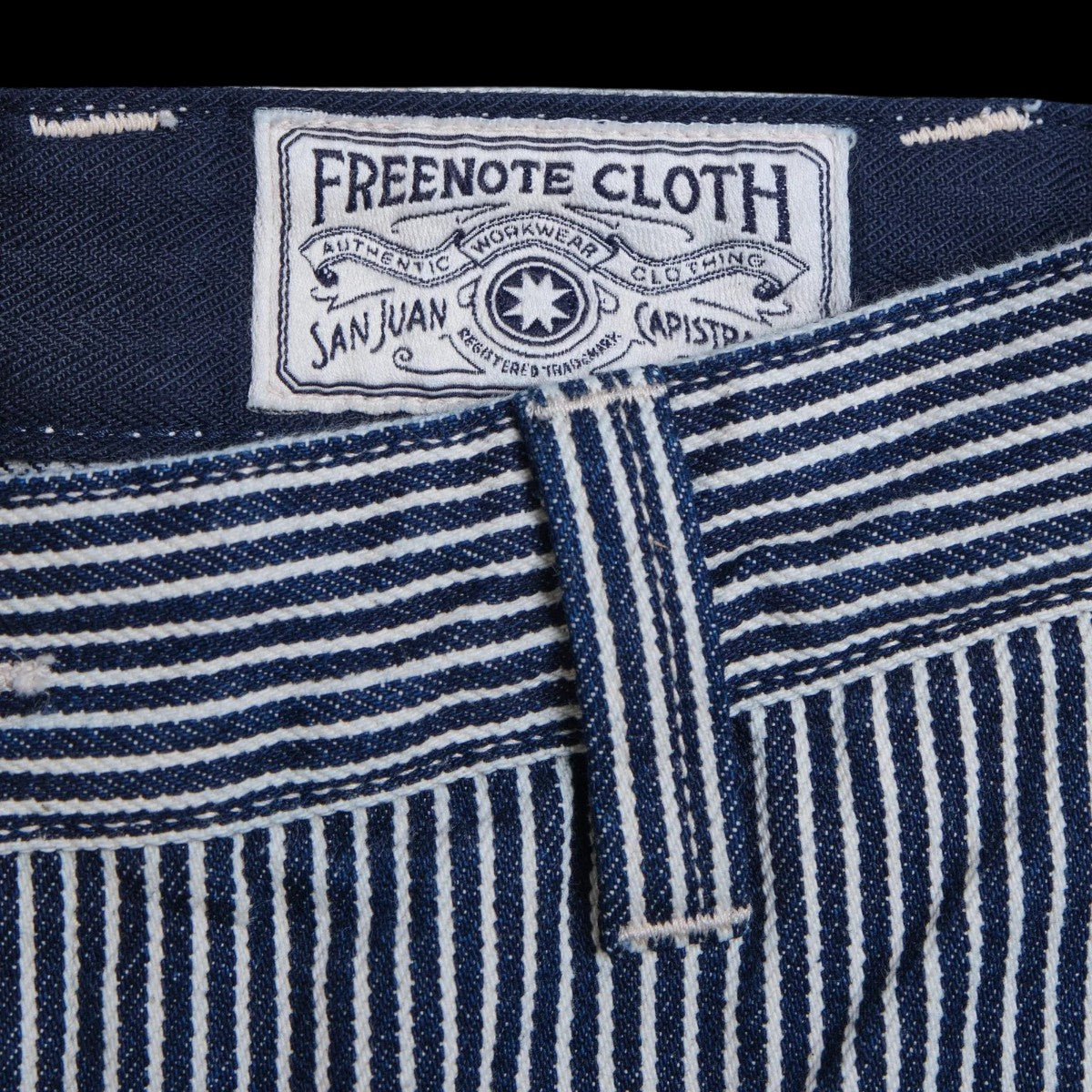 MILWORK Ortega Pant in hickory stripe denim. Classic workwear trousers with reinforced double knees and custom labels. 100% cotton.