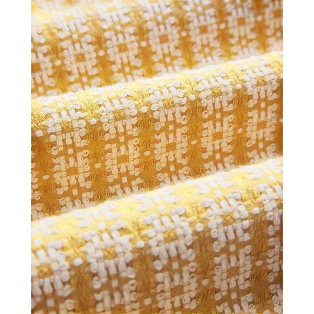MILWORK Polen yellow cotton shirt with a textured geometric pattern and mother of pearl buttons.