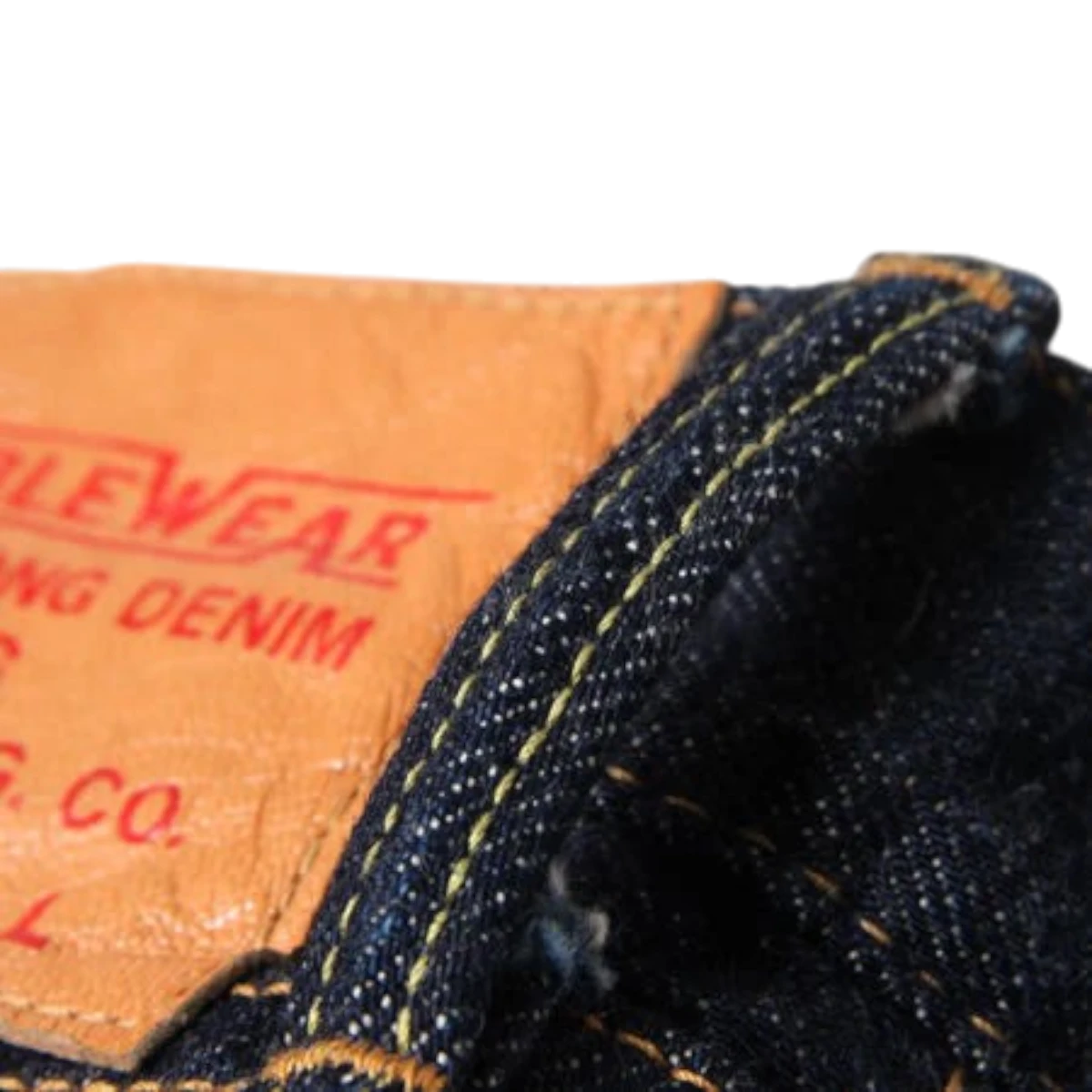 MILWORK Regular Straight Denim Once Wash Selvedge jeans, dark indigo raw denim with yellow stitching and leather patch.