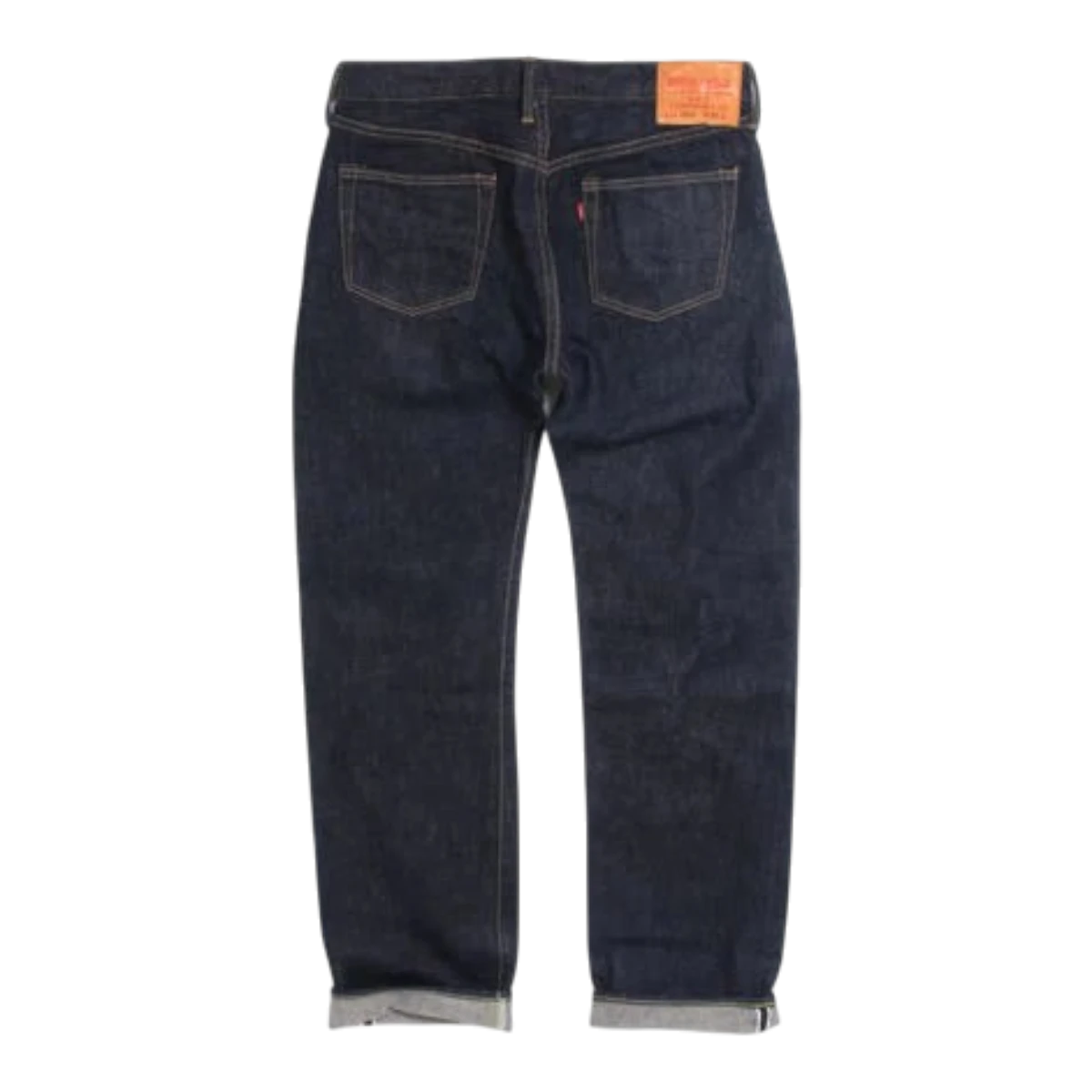 MILWORK dark indigo selvedge denim jeans, regular straight fit, five-pocket style with red tab detail.