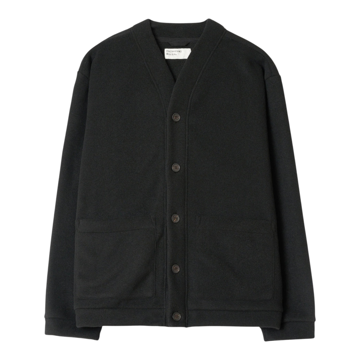 MILWORKS Advance Cardigan in black fleece with a boxy fit, V-neck, button front, and two large patch pockets.