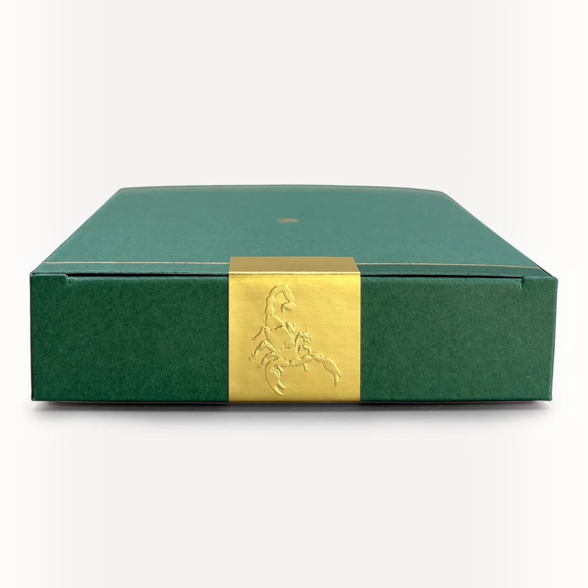 MILWORKS American Ash perfume box in dark green with a gold scorpion emblem on the center band