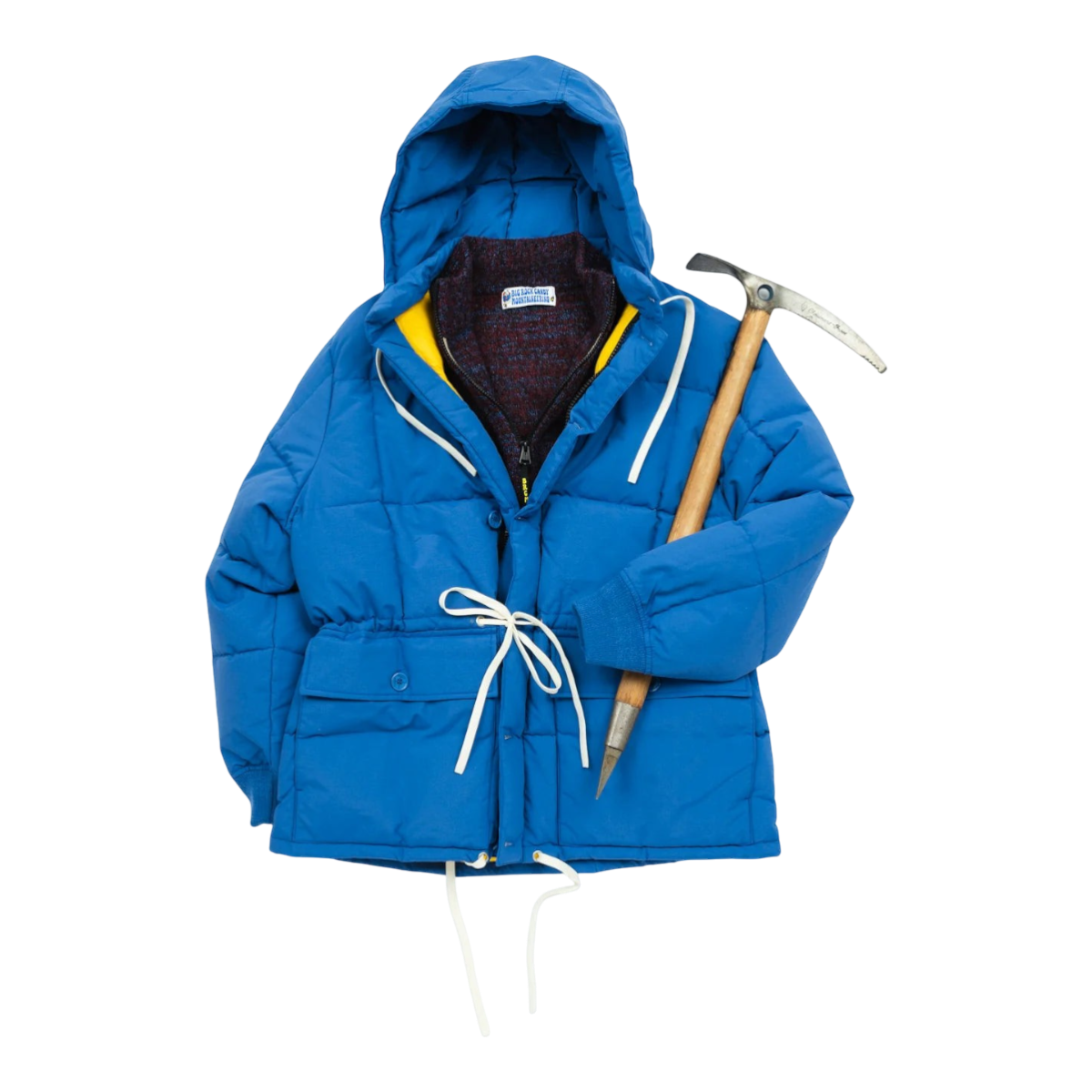 MILWORKS Arctic Parka in blue raspberry with duck-down insulation, drawstring hood, and contrasting yellow lining.