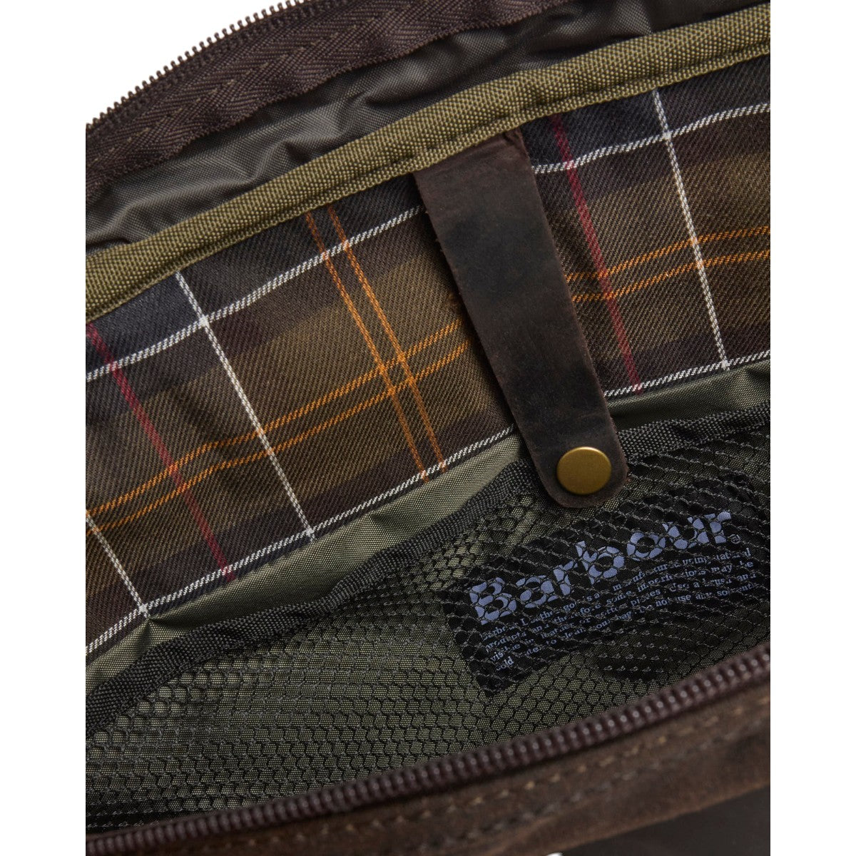 MILWORKS Barbour waxed leather briefcase interior featuring iconic classic tartan lining and branded fabric label