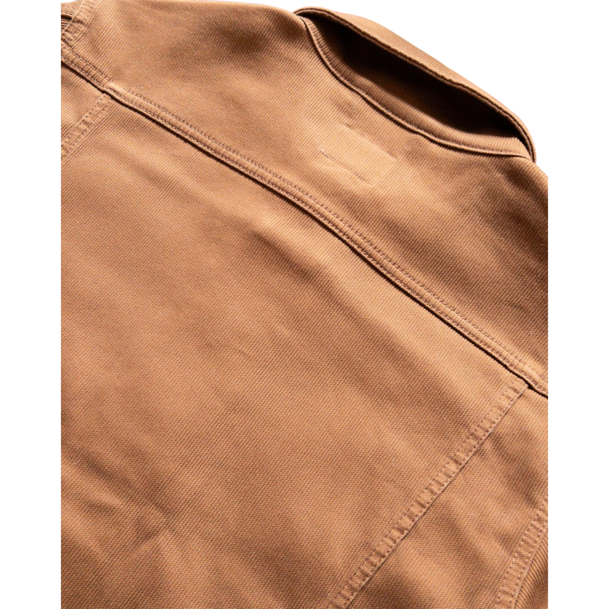 Back view of a MILWORKS Bedford Cord Ranch Jacket in bay brown, featuring durable textured fabric and collar detail.
