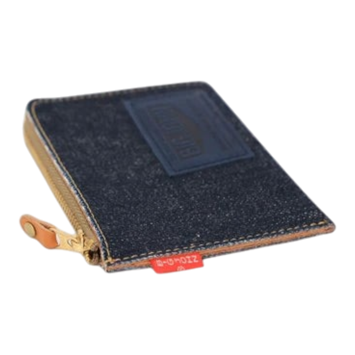 MILWORKS Big John L-zip coin case in indigo denim and Italian deerskin with a red brand tab and gold zipper
