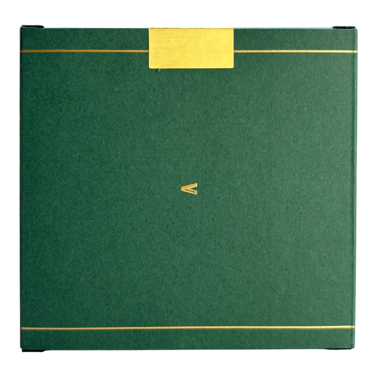 MILWORKS Black Hemlock perfume box in dark green with gold foil accents and a minimalist logo centered on the lid.