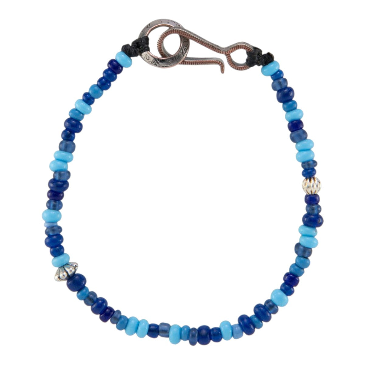 MILWORKS handmade shell bead bracelet in shades of blue with a vintage US nickel coin hook closure.