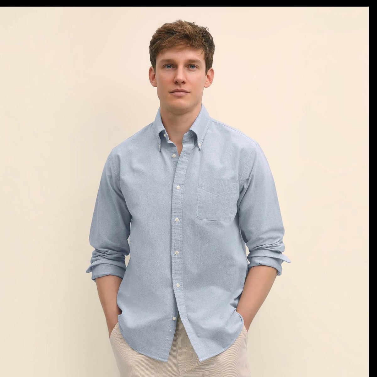 MILWORKS model wearing a light blue Brooks Brothers Friday Shirt in soft oxford cotton with a button-down collar.