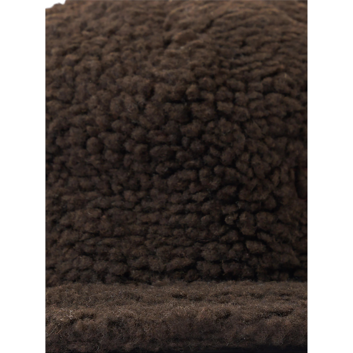 Close-up of a brown MILWORKS galaxy fleece baseball hat showing the textured sherpa-like fabric detail.