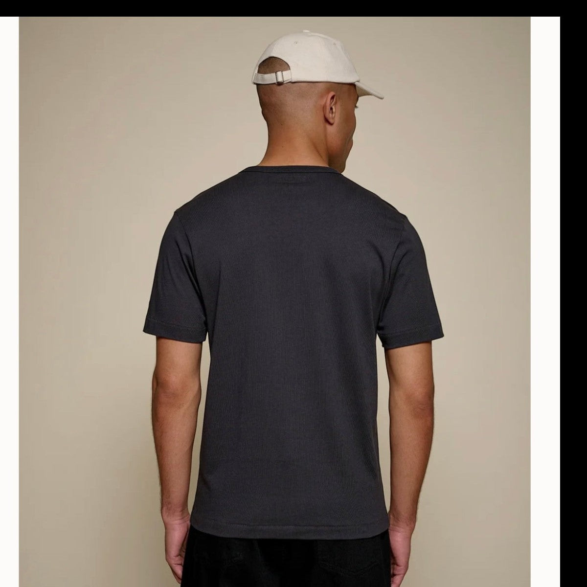 Back view of a man wearing a MILWORKS charcoal 2M15 sturdy organic cotton jersey crew-neck t-shirt