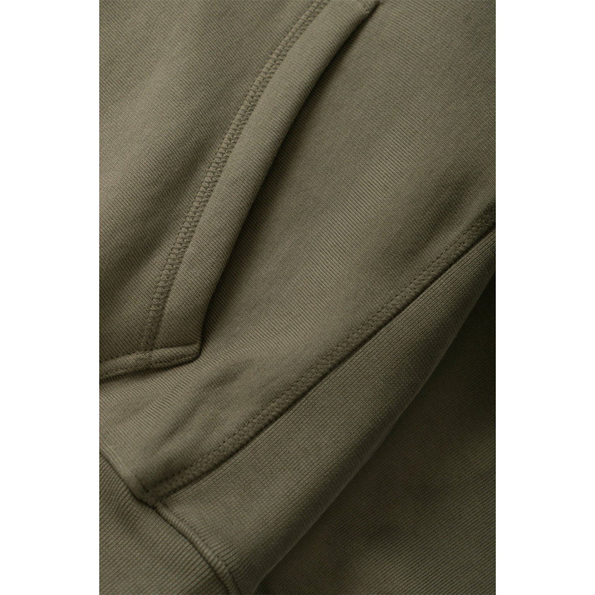Close-up of MILWORKS dark olive 16oz organic cotton brushed fleece hoodie showing durable stitching and fabric texture.