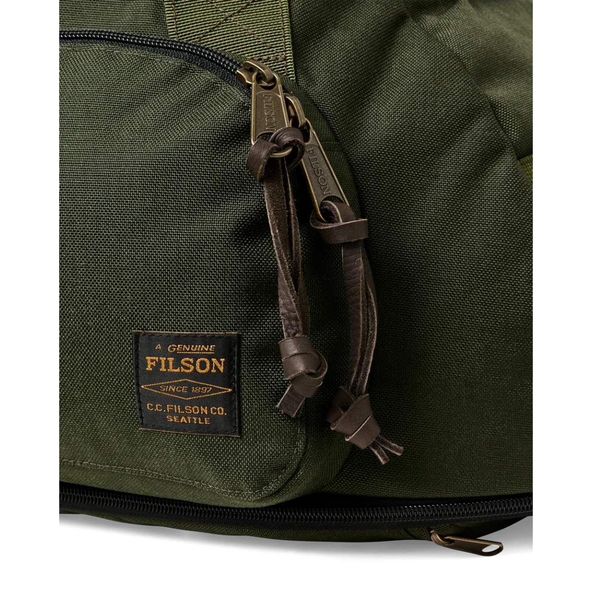 MILWORKS Dryden Duffle Pack in otter green 1000D nylon with Filson brand patch and leather zipper pulls