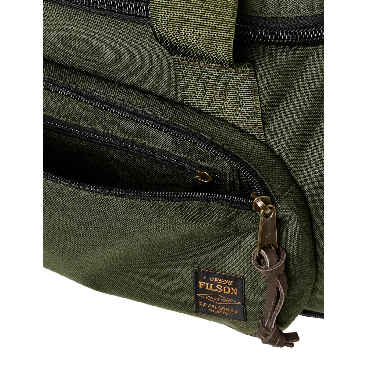 MILWORKS Dryden Duffle Pack in otter green 1000D nylon with zippered exterior pocket and Filson leather logo patch