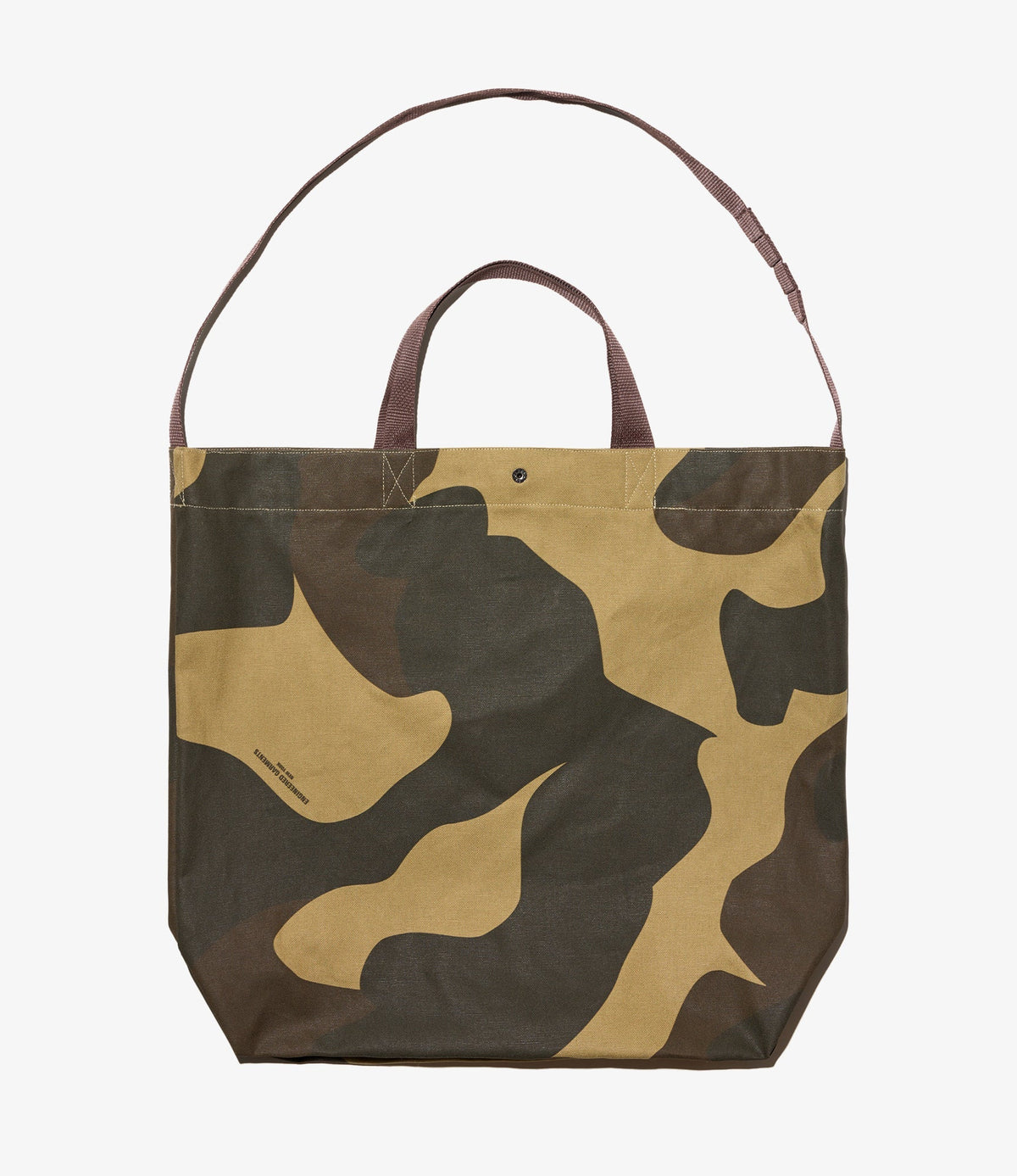 MILWORKS Carry All Tote in duck camo cotton canvas with adjustable shoulder strap and dual carry handles.
