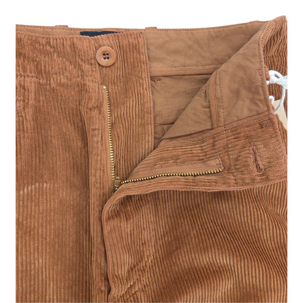 MILWORKS East Harbour Surplus amber corduroy chino trousers featuring a button fly and durable cotton construction.