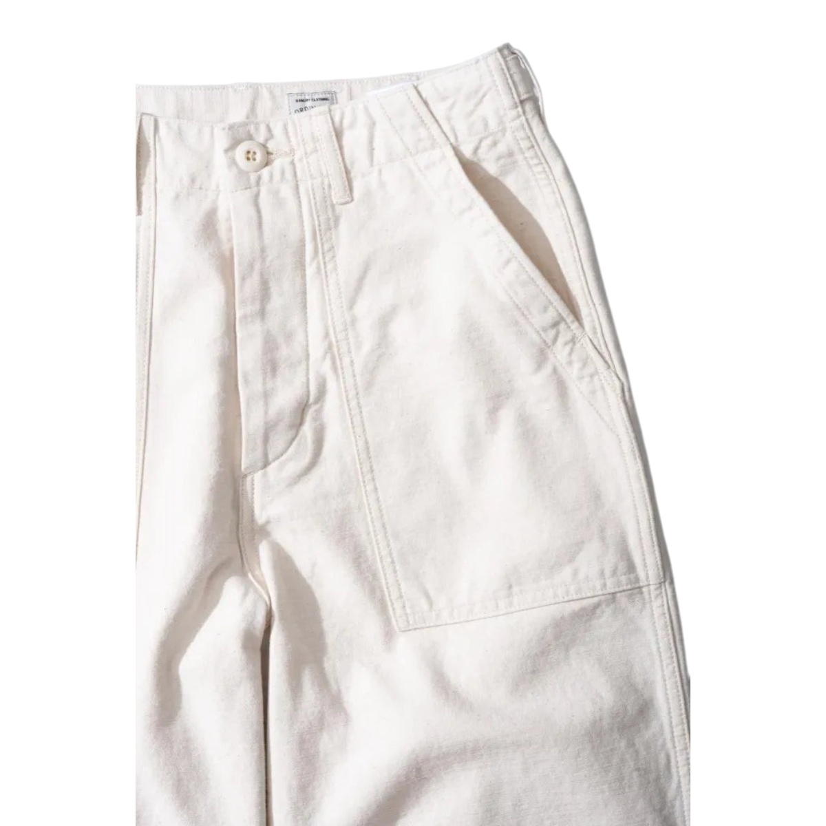MILWORKS vintage fatigue pants in ecru back sateen fabric with military-inspired patch pockets and button fly