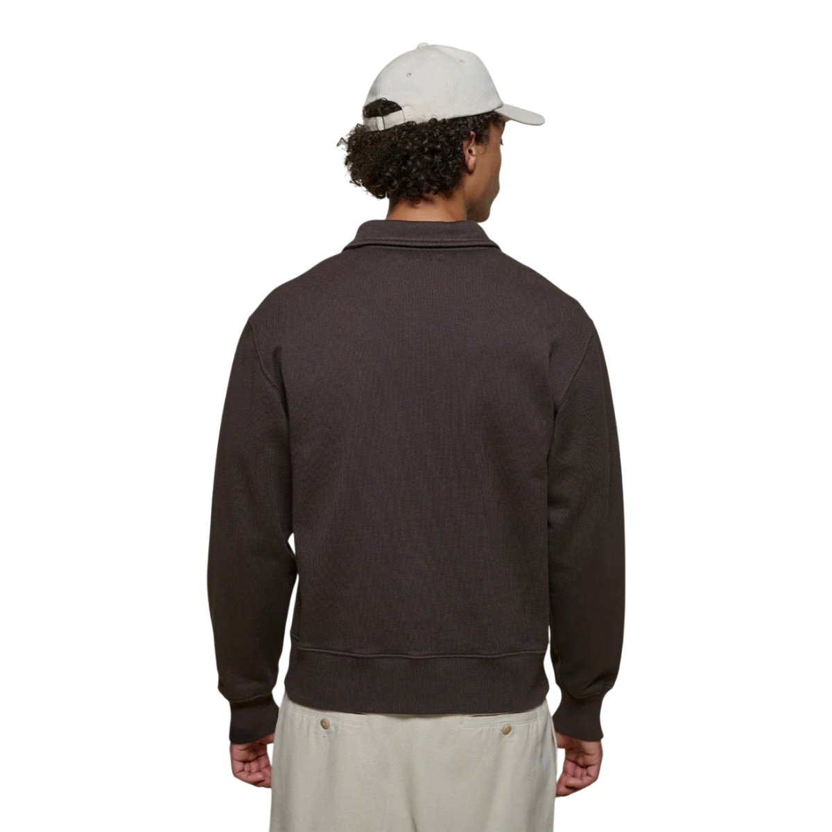 Back view of a man wearing a MILWORKS espresso brown organic cotton loopback fleece zip collar sweatshirt.