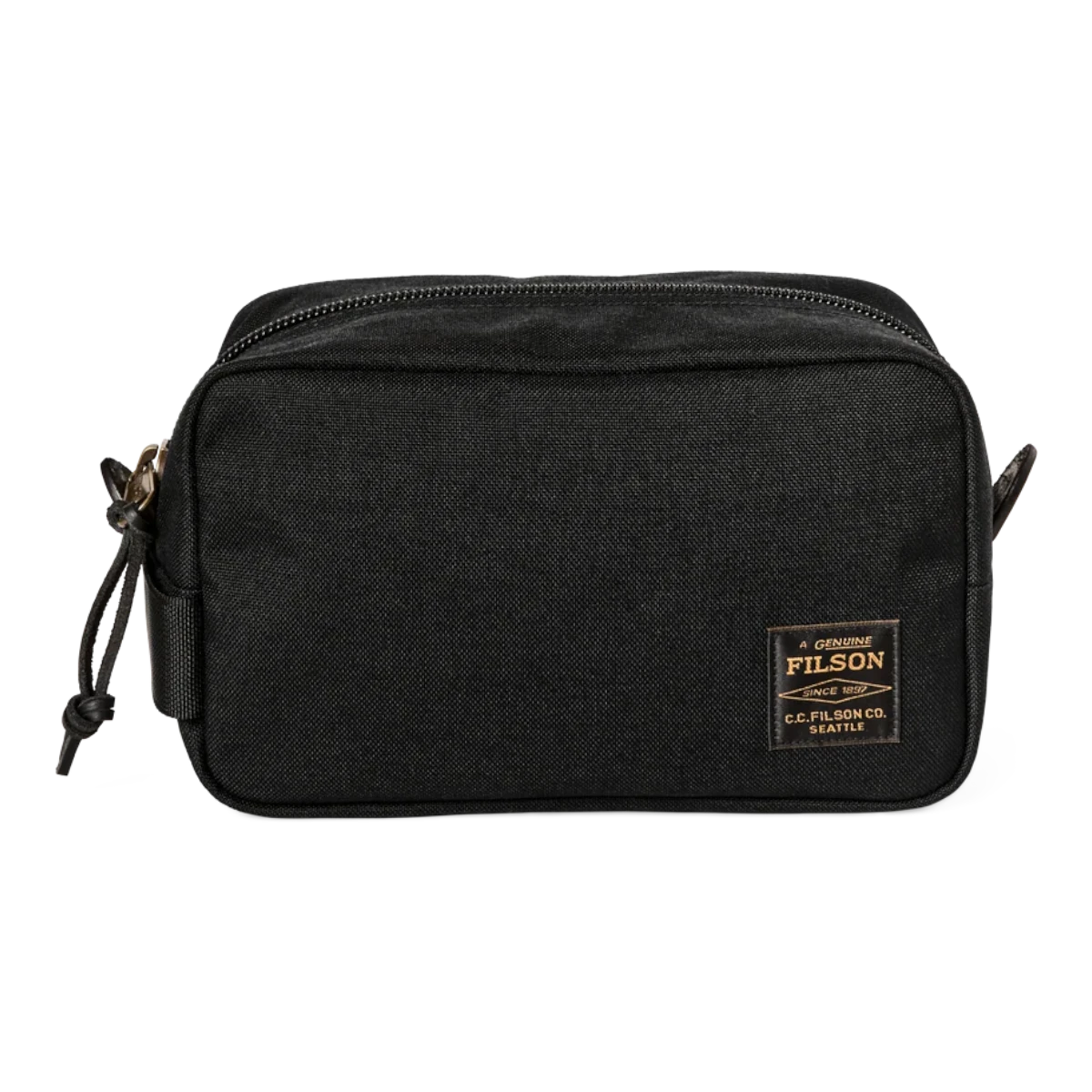 MILWORKS Filson Dryden travel pack in black Cordura nylon with a side grab handle and branded logo patch.