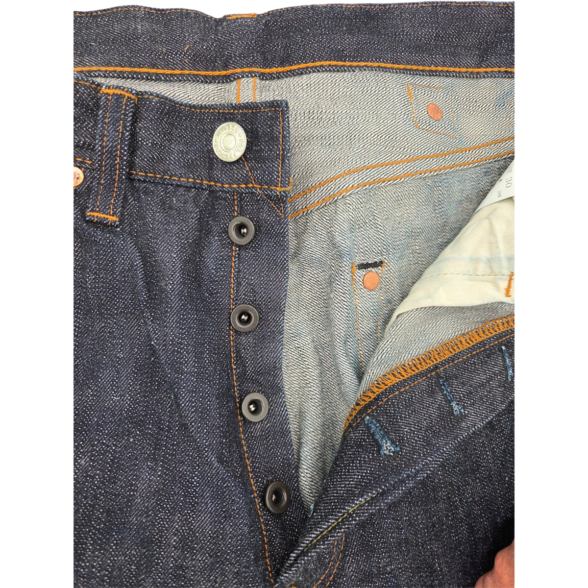 MILWORKS F.O.B Factory selvedge denim overalls in dark rinse indigo with button fly and contrast orange stitching