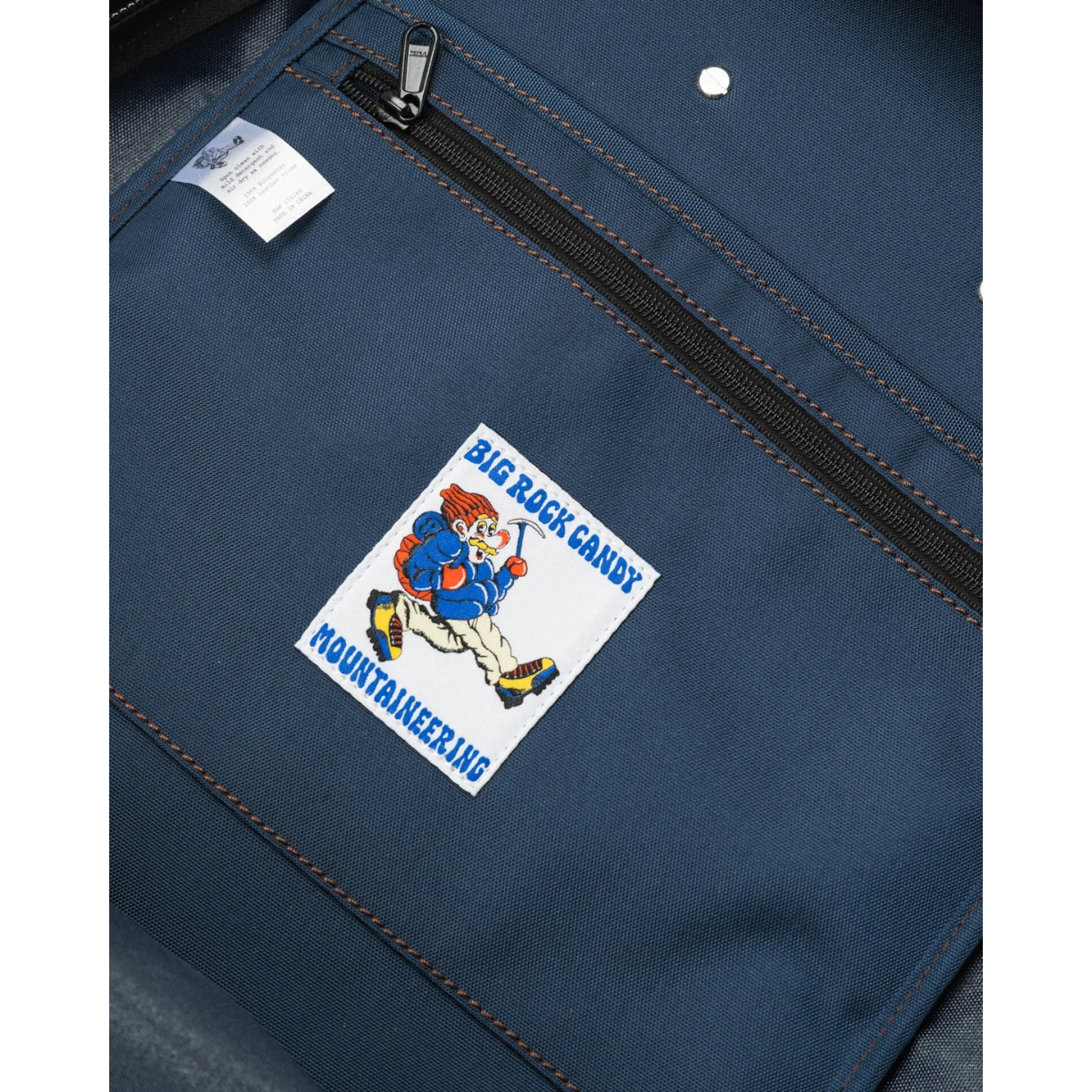 MILWORKS Gator Pack V2 in blackberry featuring a Big Rock Candy Mountaineering patch and zippered front pocket