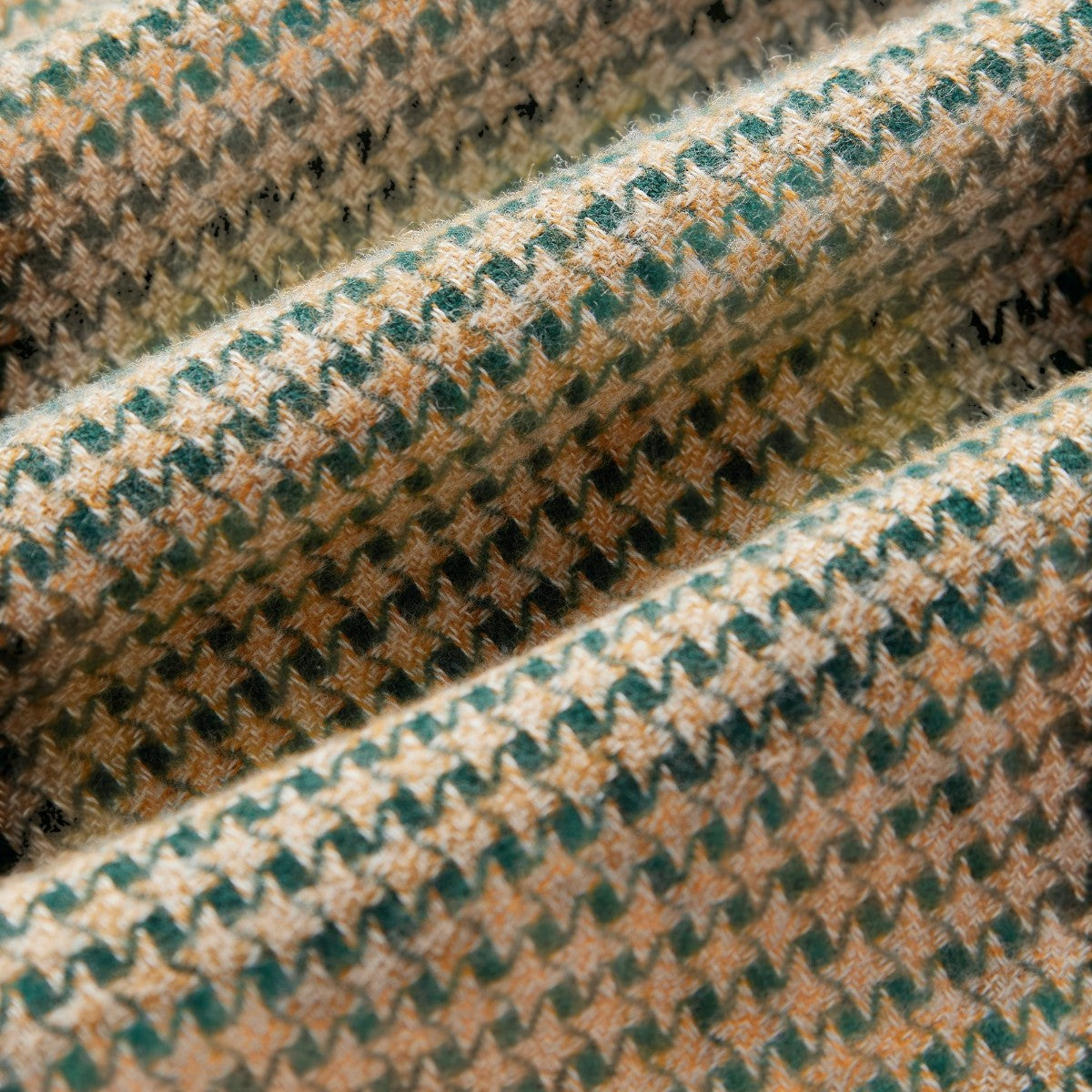 MILWORKS Portuguese Flannel shirt fabric featuring a detailed green and beige abstract houndstooth pattern