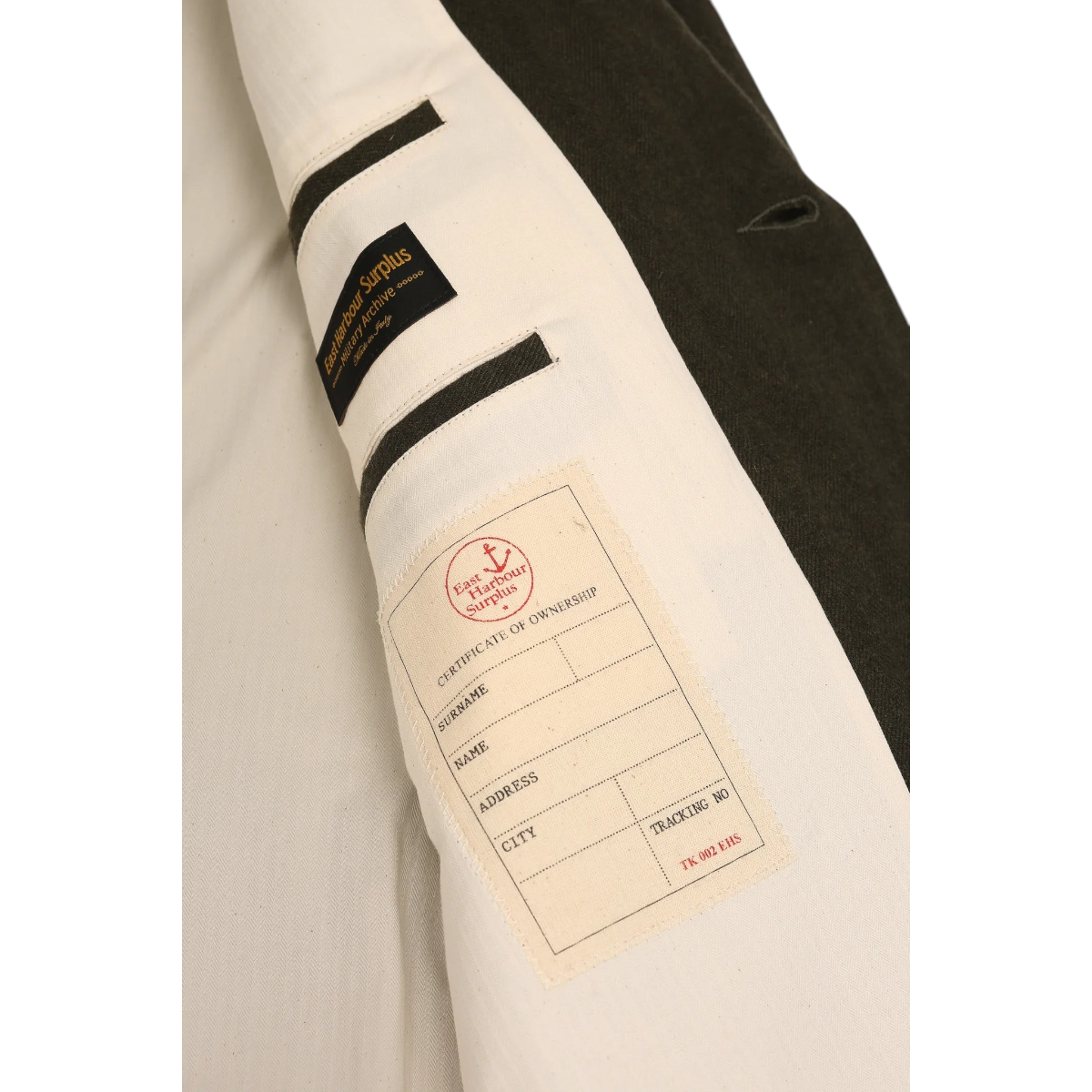 MILWORKS East Harbour Surplus green wool-linen sports jacket interior with branded label and ownership certificate