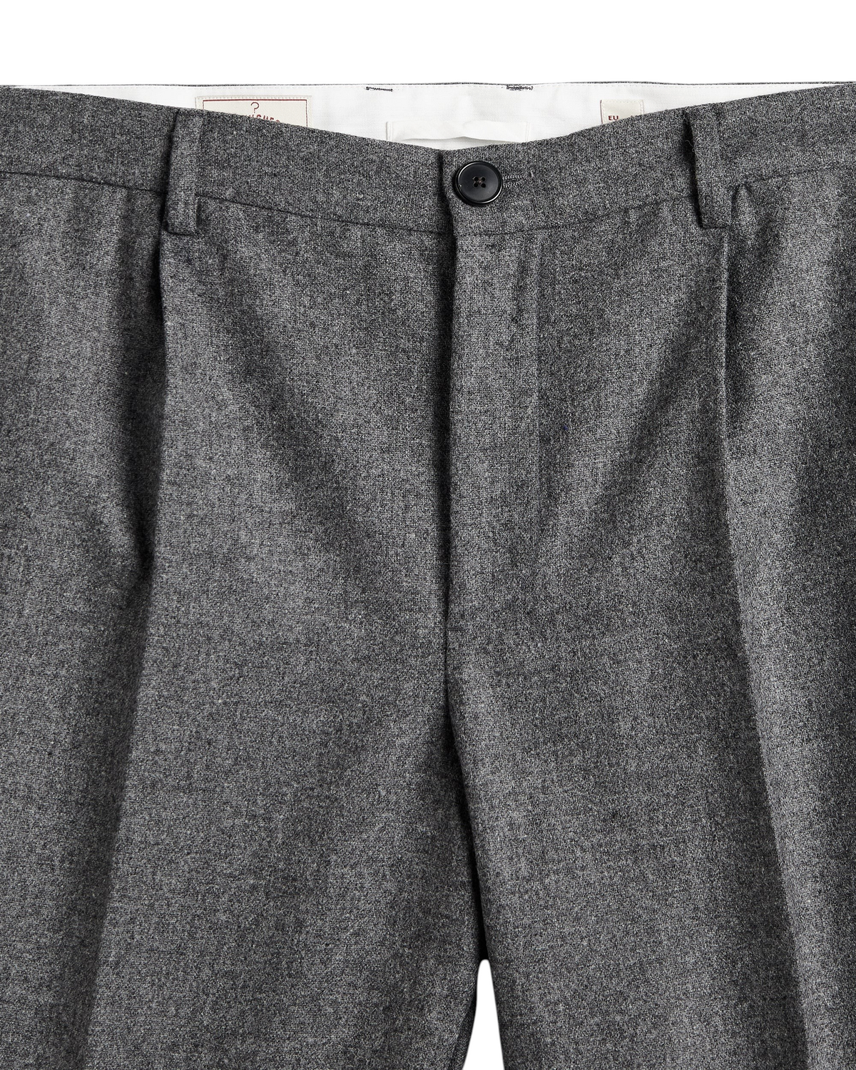 MILWORKS grey virgin wool single pleat trousers with a button fly and belt loops