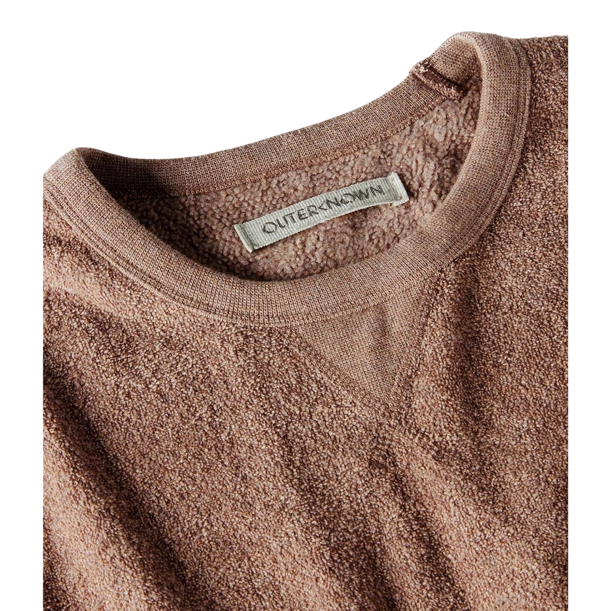 MILWORKS Hightide Crew sweatshirt in heather coconut brown, featuring a textured knit and classic crew neck with a subtle V-stitch detail.